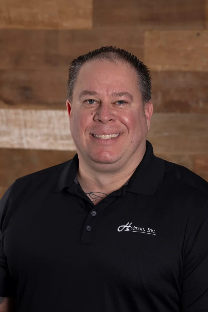 Jason Henricks, Field Supervisor in the Door Division at Holman, Inc., smiling in a headshot.