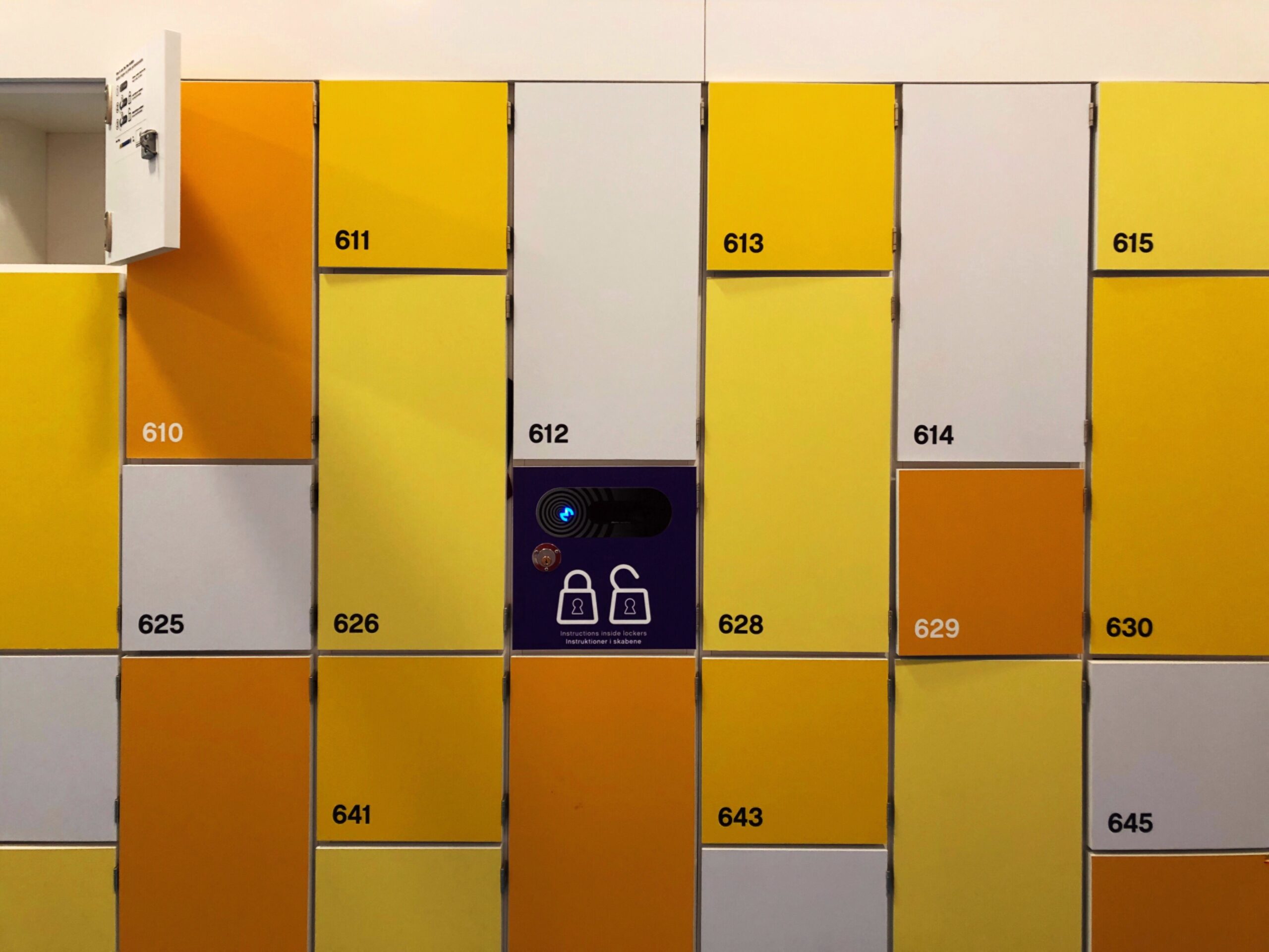 yellow orange and white lockers with digital key